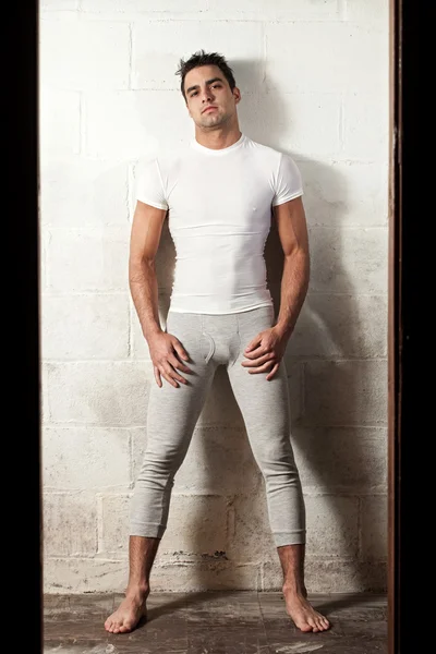 Man in long underwear and white compresion shirt. — Stock Photo, Image