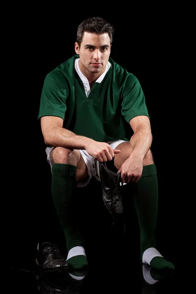 Jugador de rugby masculino. Estudio filmado sobre negro . —  Fotos de Stock