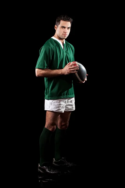 Jogador de rugby masculino. Estúdio tiro sobre preto . — Fotografia de Stock