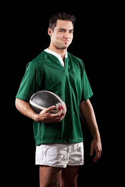 Jogador de rugby masculino. Estúdio tiro sobre preto . — Fotografia de Stock
