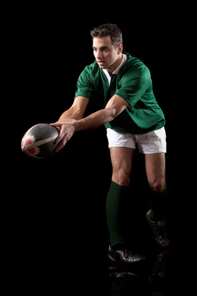 Giocatore di rugby maschile. Studio girato sopra nero . — Foto Stock