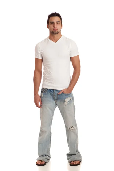 Dorywczo młody człowiek w dżinsy i t-shirt. łapka na biały. — Zdjęcie stockowe