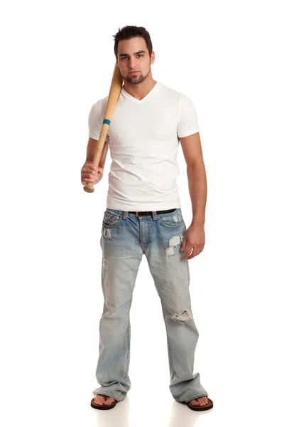 Lässiger junger Mann in Jeans und T-Shirt. Studioaufnahme über Weiß. — Stockfoto