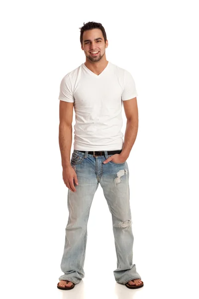 Kot pantolon ve t-shirt sıradan genç adam. Beyaz ateş studio. — Stok fotoğraf