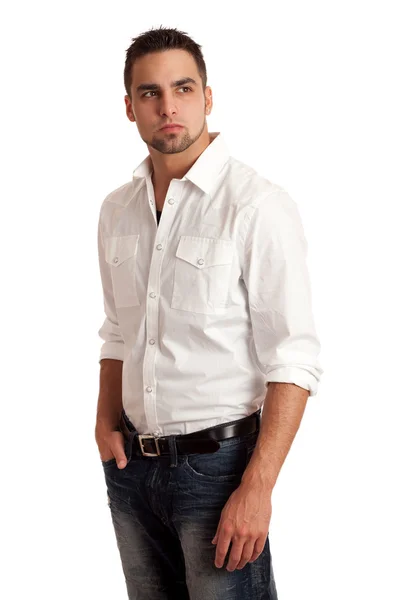 Junger Mann in Hemd und Jeans. Studioaufnahme über Weiß. — Stockfoto