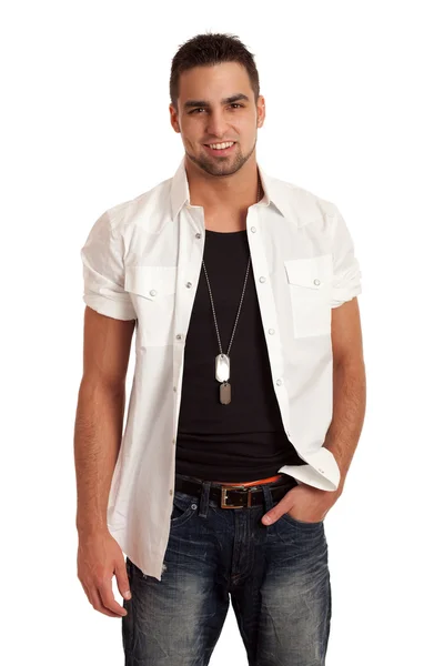 Jonge man in het shirt en spijkerbroek. studio opname over Wit. — Stockfoto