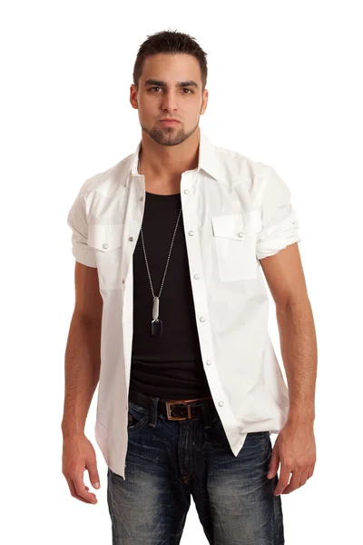 Młody człowiek w dżinsy i koszulę. łapka na biały. — Zdjęcie stockowe
