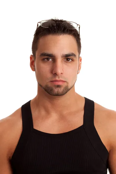 Young man in black undershirt. Studio shot over white. — Stock Photo, Image