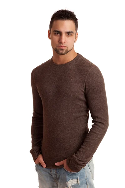 Young man in sweater and jeans. Studio shot over white. — Stock Photo, Image