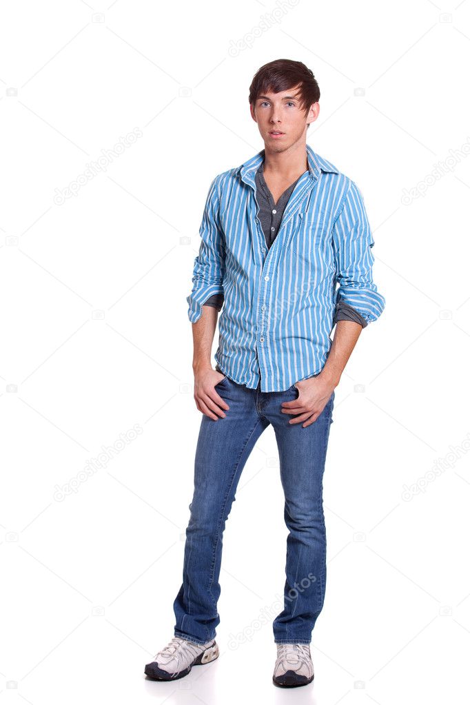 Young man in blue jeans and shirt. Studio shot over white. — Stock ...