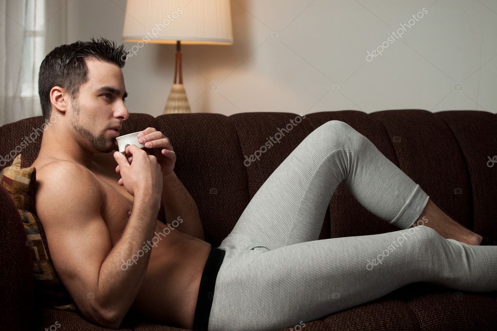 Man Sitting In Hotel Room In His Underwear by Stocksy Contributor  VegterFoto - Stocksy
