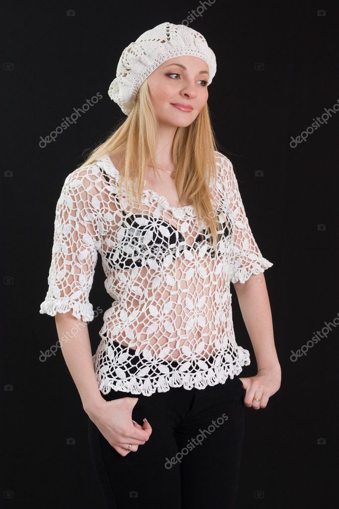 Beautiful girl in white beret and knitted jacket. — Stock Photo