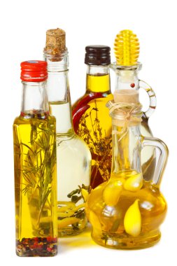 Olive oil with herbs and spices. clipart