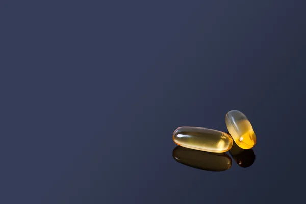 Pillen op donker grijze achtergrond — Stockfoto