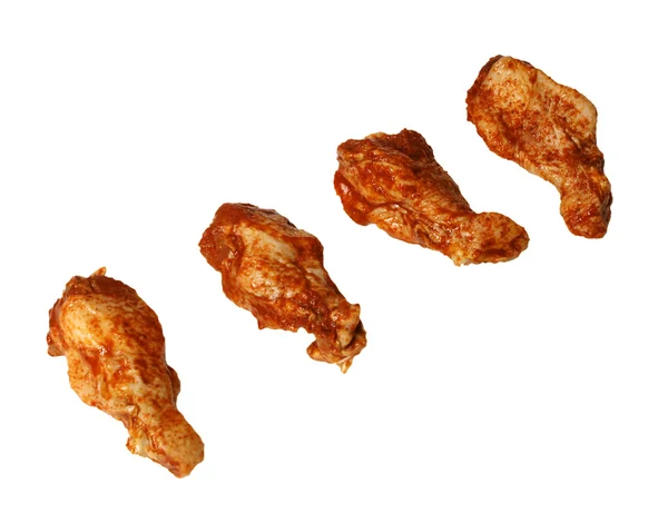 Cuatro alas de pollo marinadas —  Fotos de Stock