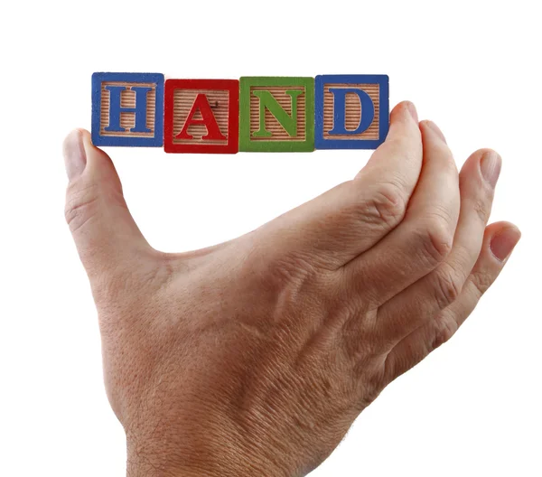 La mano sostiene la palabra — Foto de Stock
