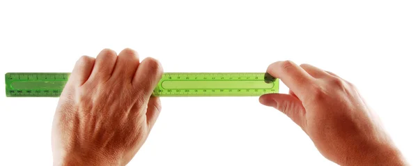 Hands green ruler — Stock Photo, Image