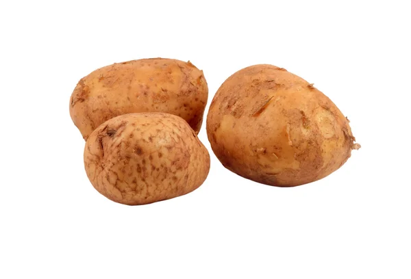 Три целых картофеля белый фон — стоковое фото