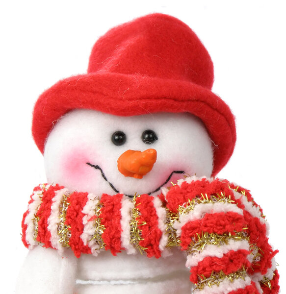 Smiling snow man face in the red cap and scarf