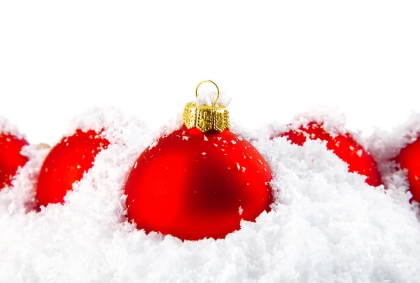 Christmas holiday decoration with white snow and red bowls — Foto de Stock