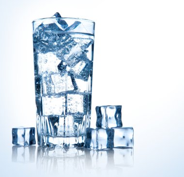 Glass of fresh cool water with ice clipart