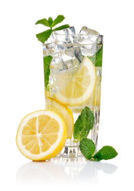 Glass of fresh cool water with lemon clipart