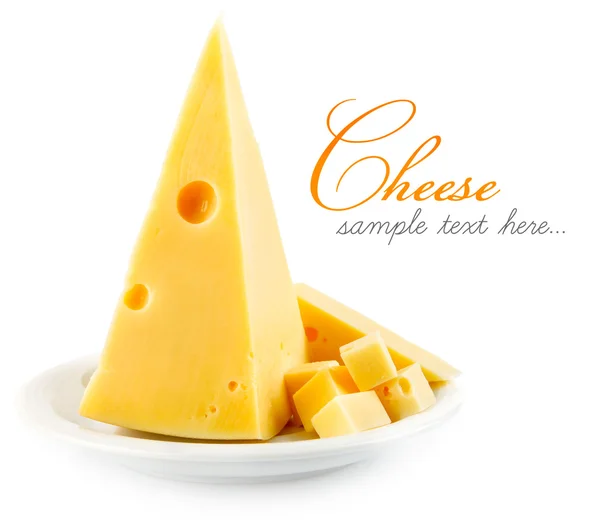 Coupe le fromage sur la plaque jaune — Photo