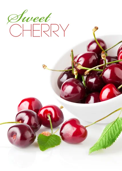 Fresh cherry berries with green leaf — Stock Photo, Image