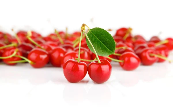 Fresh cherry fruits with green leaves — Stock Photo, Image