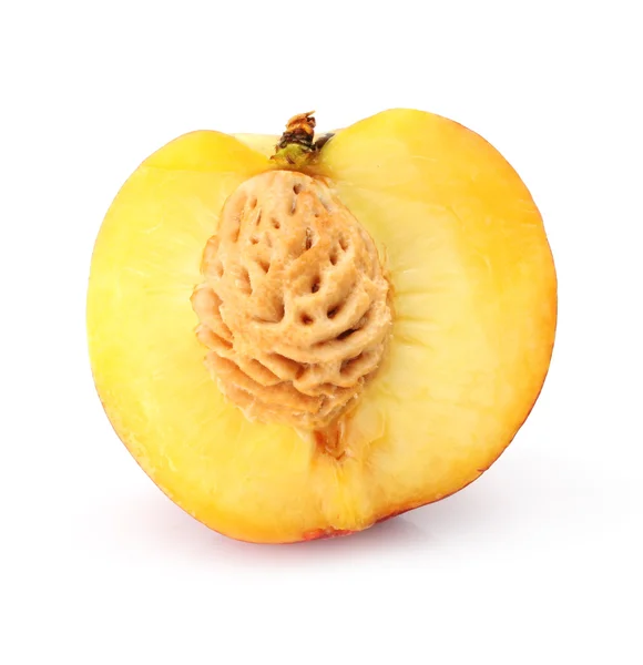 Natural peach fruit cut isolated on white — Stockfoto