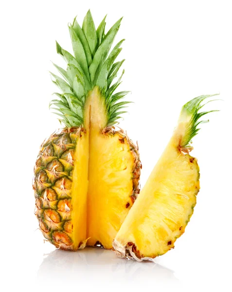 Fresh pineapple with cut and green leaves — Stock Photo, Image