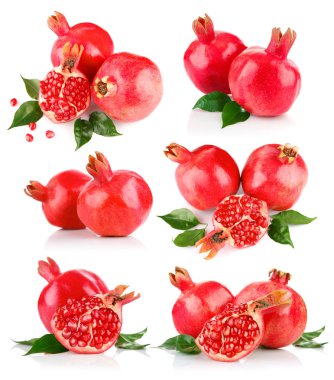 Set pomegranate fruits with cut and green leaf clipart