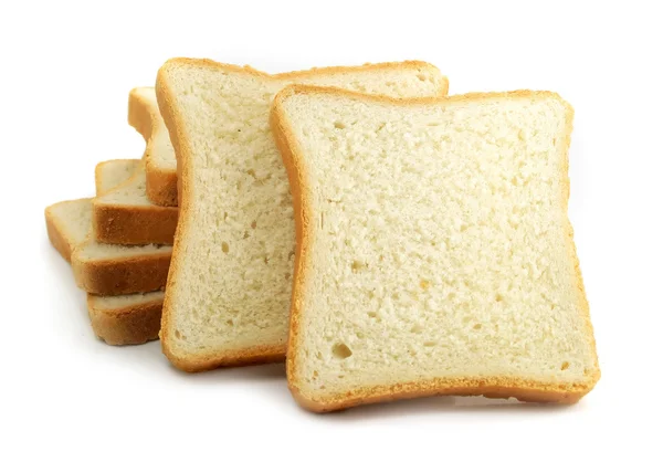Pan fresco cortado sobre fondo blanco — Foto de Stock