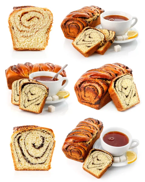Set van zoete fancy bakken met thee beker — Stockfoto