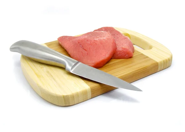 Meat and knife food on the board isolaited — Stock Photo, Image