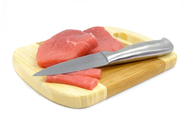 肉およびボード isolaited の上に食べ物のナイフ — ストック写真