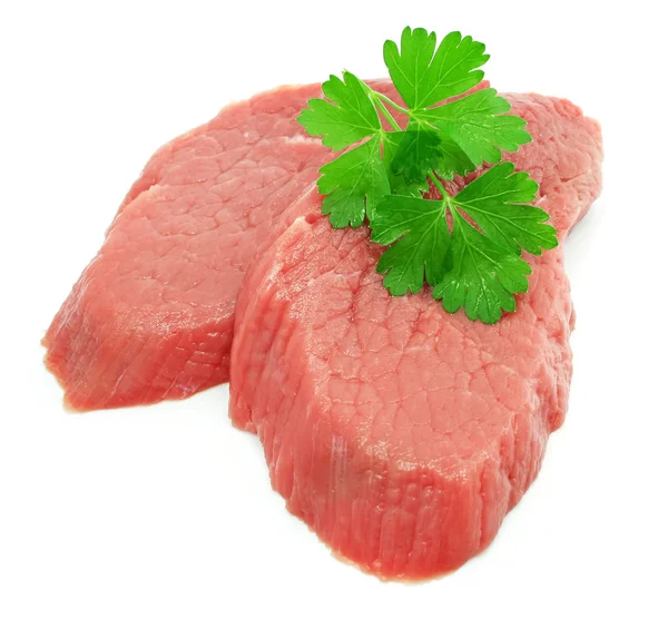 Due fette di carne con foglia di prezzemolo verde — Foto Stock