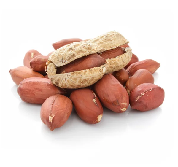 Dried peanut fruits isolated on white — Fotografie, imagine de stoc