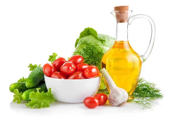 Set fresh vegetables with olive oil — Stock Photo, Image