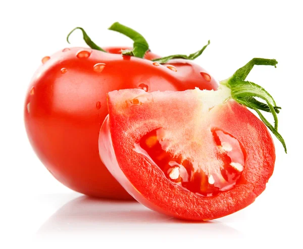Färsk tomat i snitt med blad persilja — Stockfoto