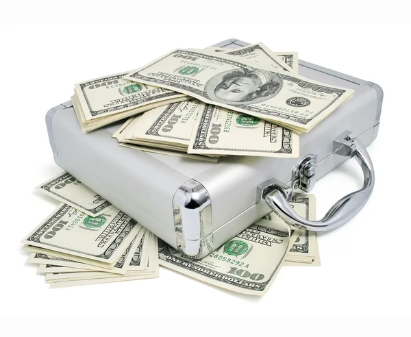Verpakkingen van dollar geld op de zilveren koffer — Stockfoto