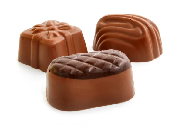 Gruppo di caramelle di cioccolato dolce isolato — Foto Stock