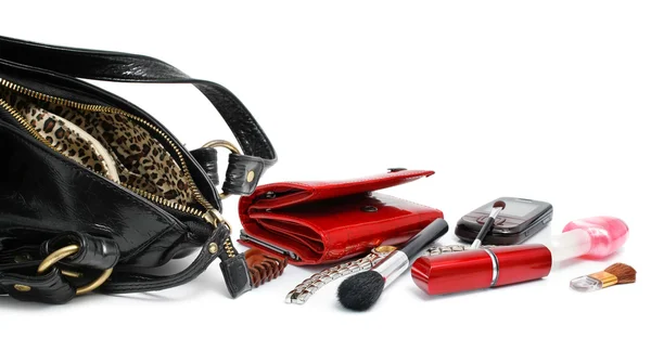 Abra o saco preto com acessórios cosméticos femininos — Fotografia de Stock