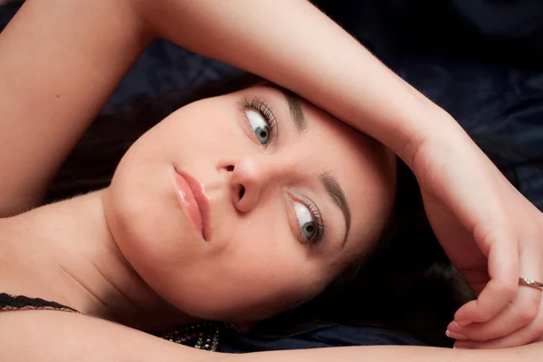 stock image Girl laying in bed