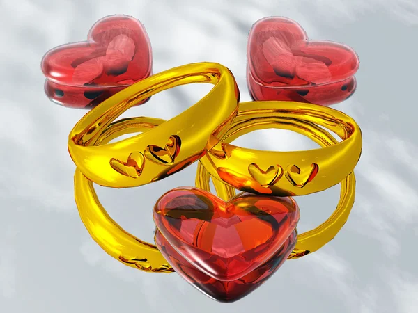 Anéis de casamento e corações — Fotografia de Stock