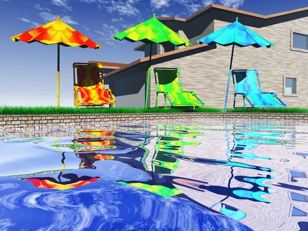 Swimming pool with parasols and chaise-longues — Stock Photo, Image