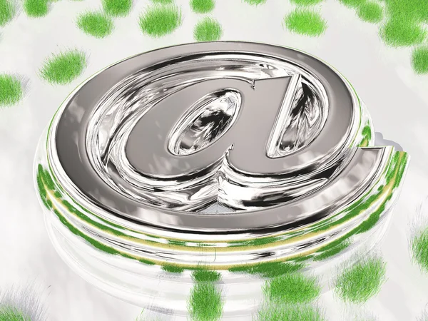 Silver "at" symbol med gräs. — Stockfoto