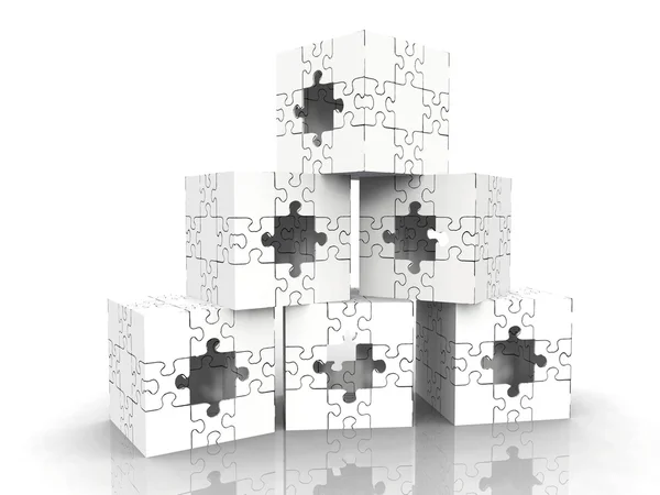 Cubi fatti di pezzi di puzzle — Foto Stock