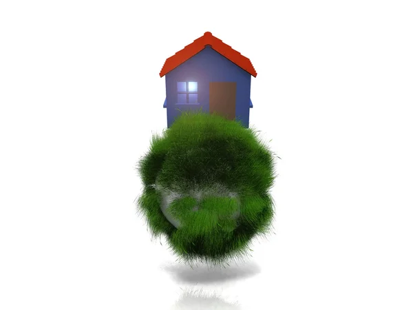 Pequena casa em uma bola de grama — Fotografia de Stock