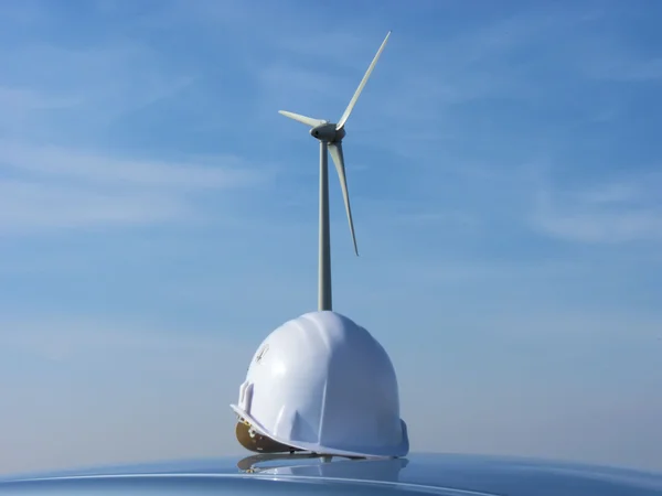 The wind turbine and the helmet — Stock Photo, Image